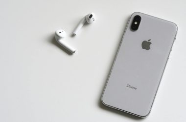 silver iphone x with airpods